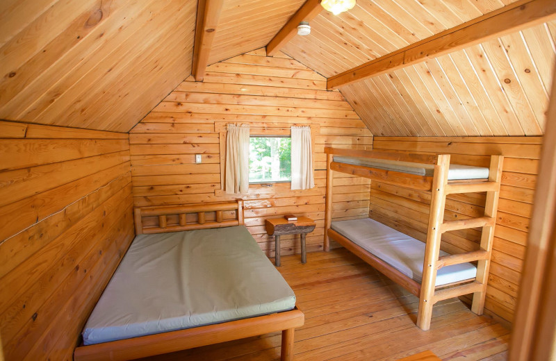 Cabin bedroom at Old Forge Camping Resort.