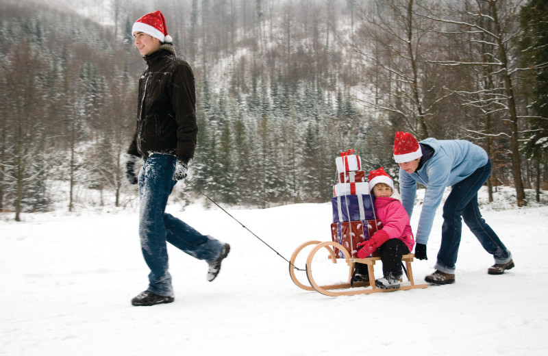 Family sledding at The Meadowmere Resort.