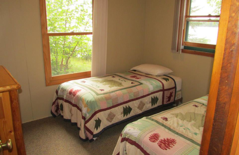 Cabin bedroom at Elbow Lake Lodge.