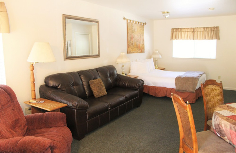 Cabin bedroom at Long Barn Lodge.