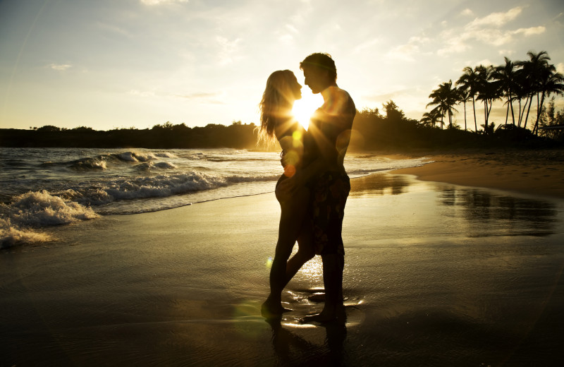 Couple on beach at Travel Resort Services, Inc.