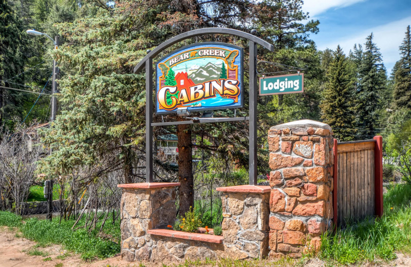 Sign for Colorado Bear Creek Cabins.