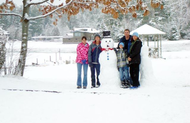 Building a snowman at Wildwood on the Lake.