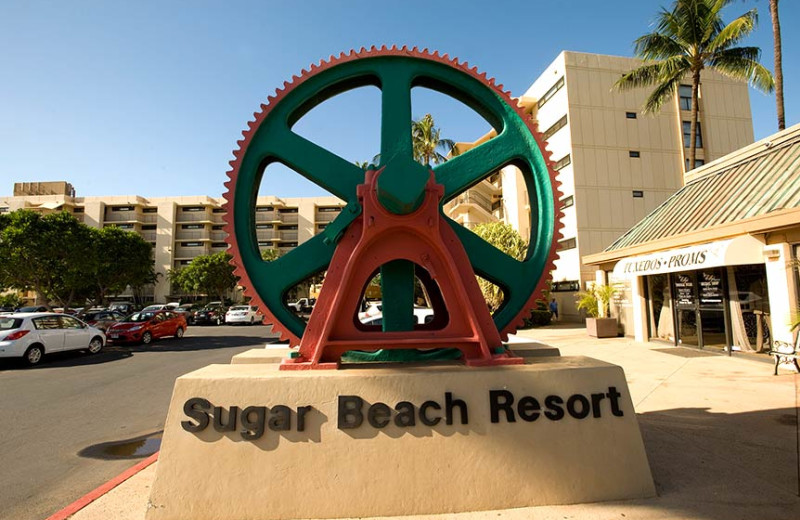 Sugar Beach Resort sign.