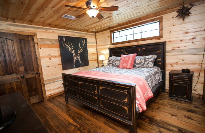 Cabin bedroom at Kiamichi Country Cabins.