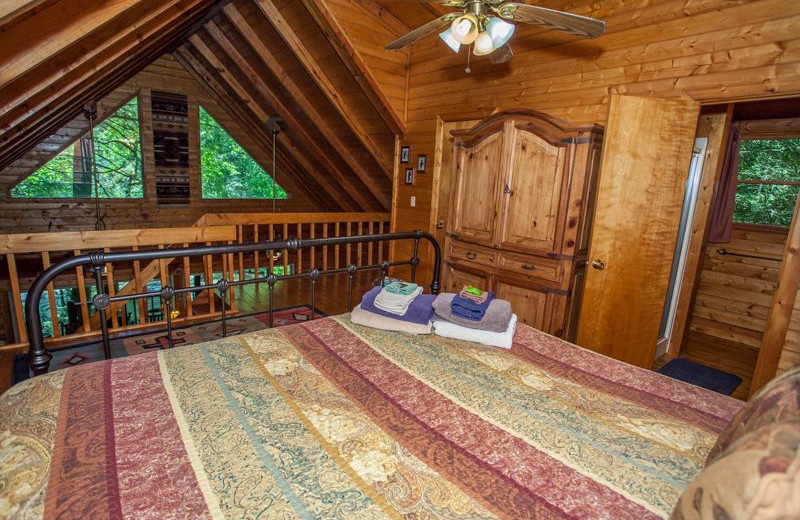 Rental loft bedroom at Blue Sky Cabin Rentals.