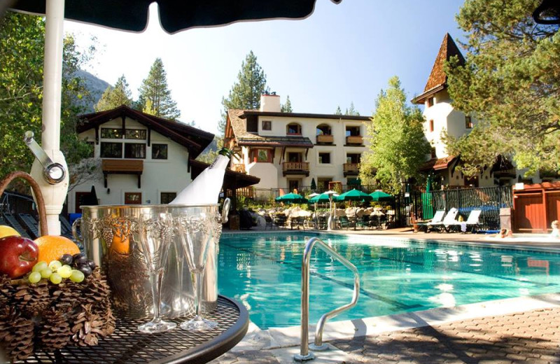 Exterior view of outdoor pool at Olympic Village Inn.