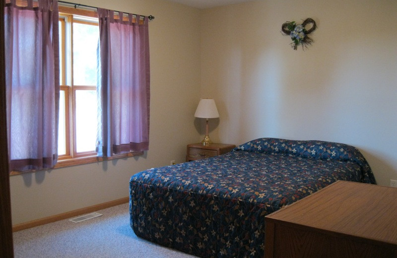 Cabin bedroom at Betsy Ross Resort.