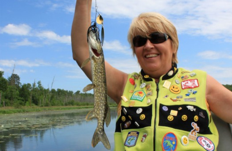 Lady With Fish at Janetski's Big Chetac Resort 