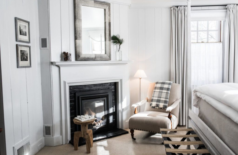 Guest room with gas fireplace at Edson Hill.