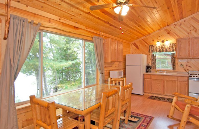 Cabin kitchen and dining room at Moose Track Adventures Resort.