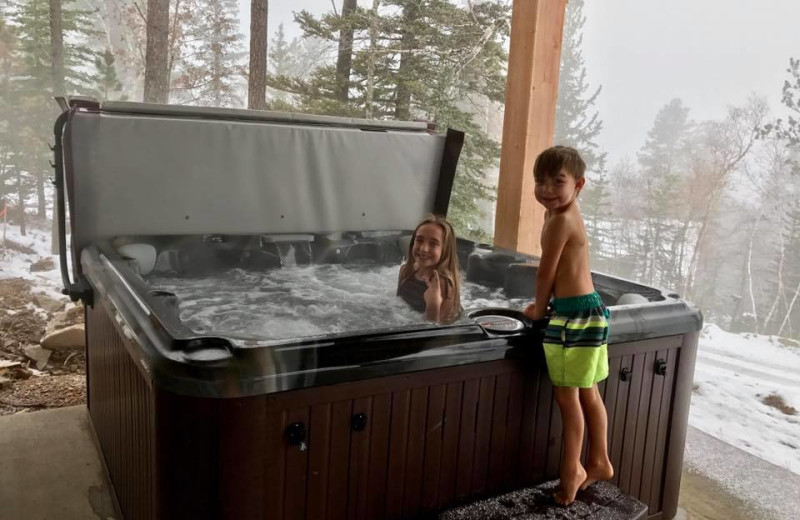 Kids in hot tub at Terry Peak Chalets.