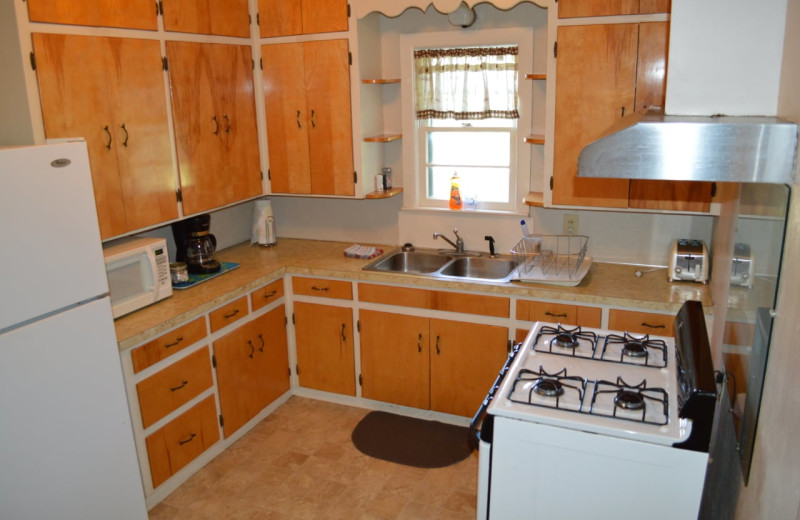 Cabin kitchen at Mulberry Mountain Lodging & Events.