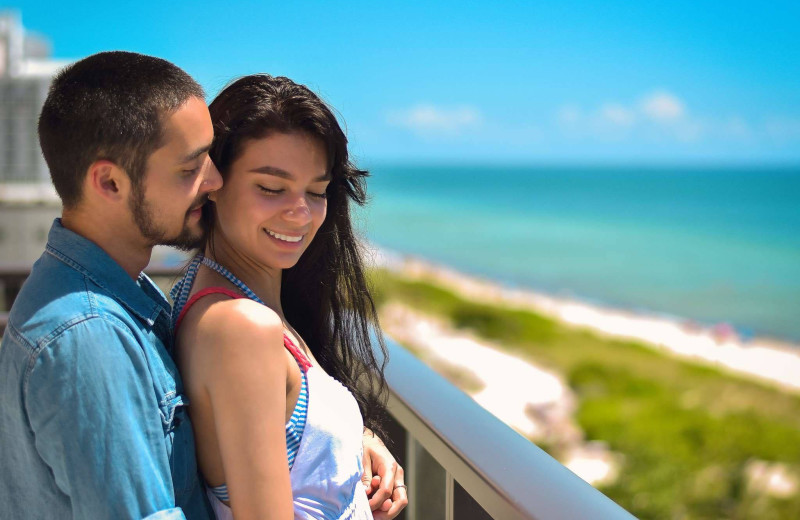 Couple at The Alexander All Suite Oceanfront Resort.