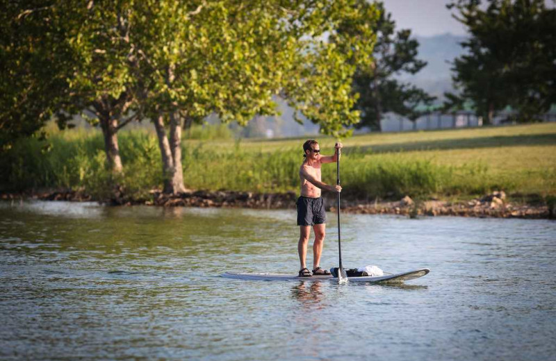 Paddle boarding at Branson Vacation Rentals.
