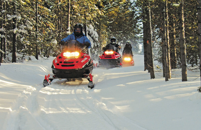 Snowmobiling at The Resort at Paws Up.