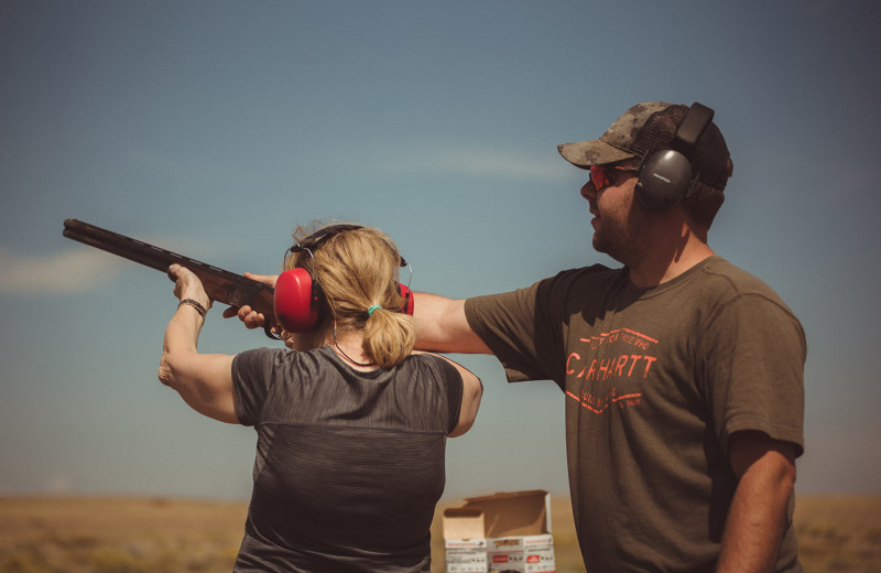 Shooting practice at Vee Bar Guest Ranch.