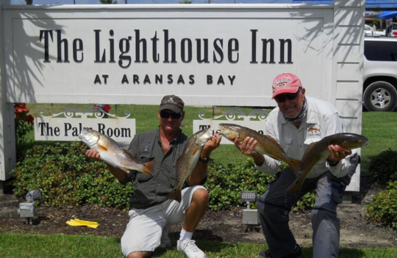 Lighthouse Inn at Aransas Bay sign