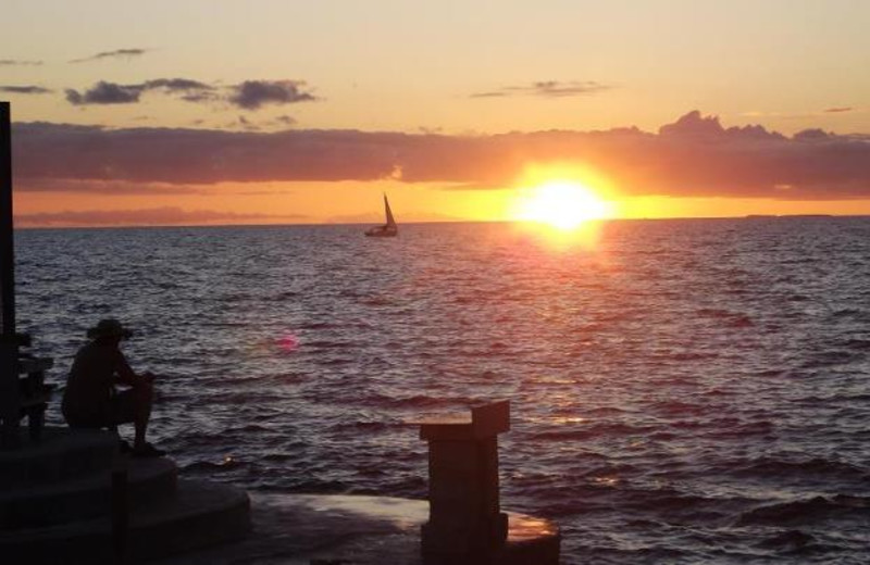 Sunrise over ocean at Coral Bay Resort. 