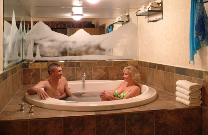 Relaxing in hot tub at Douglas Fir Resort & Chalets.