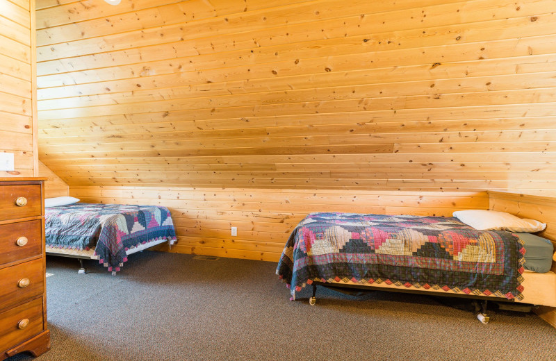 Cabin bedroom at Otter Tail Beach Resort.