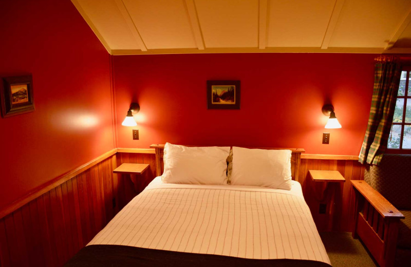 Cabin bed at Johnston Canyon Lodge & Bungalows.