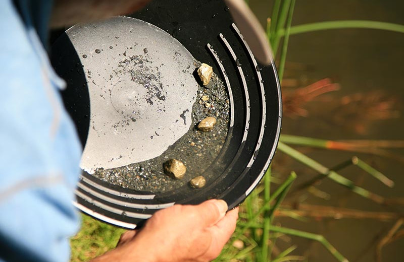 Panning for gold near Big Sky Charter & Fishcamp.