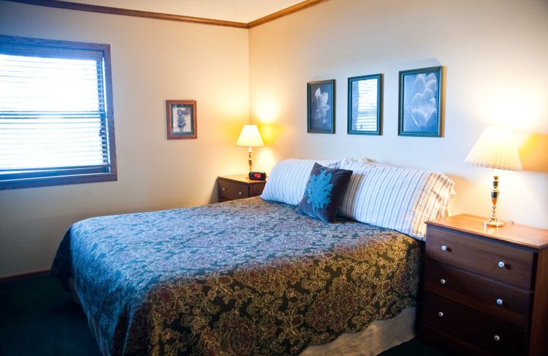 Cabin bedroom at Campfire Bay Resort.