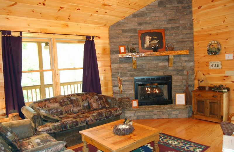 Cabin living room at Cuddle Up Cabin Rentals.