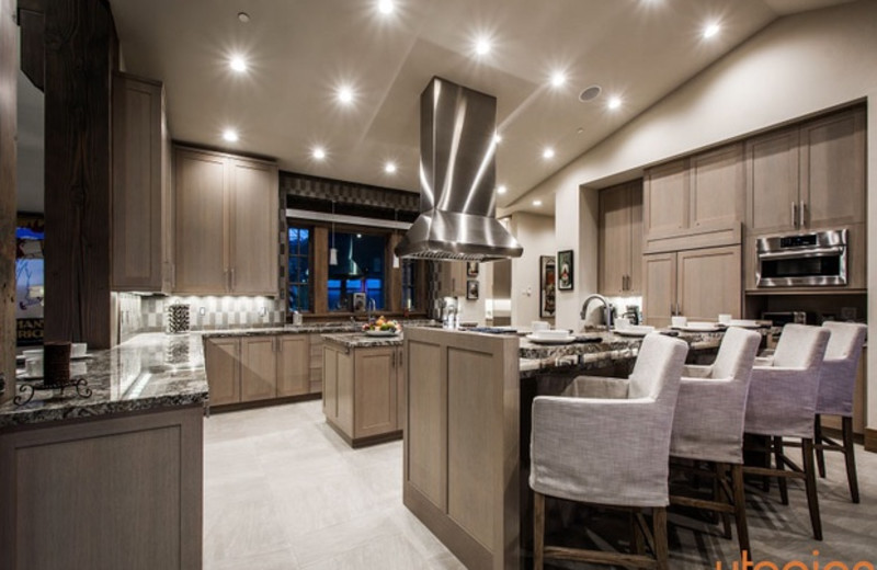 Rental kitchen at Utopian Luxury Vacation Homes.