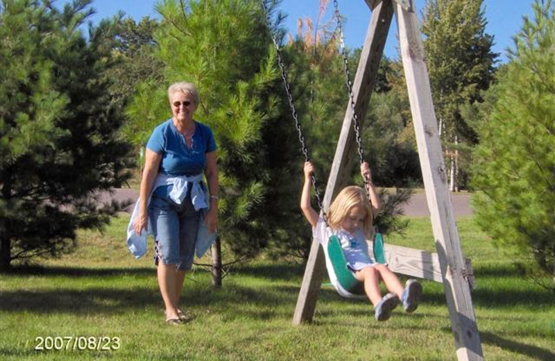 Swinging with grandma at Woodside Cottages of Bayfield.