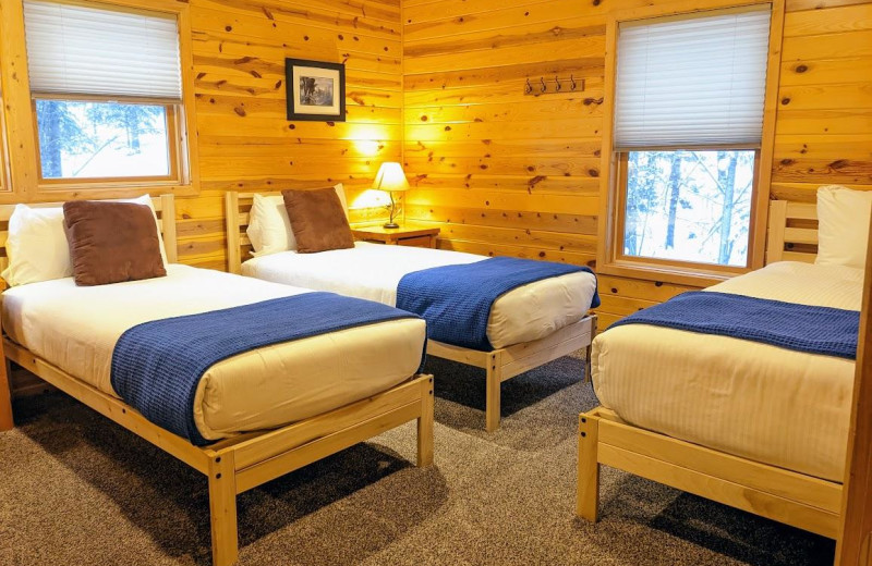 Cabin bedroom at Pehrson Lodge Resort.