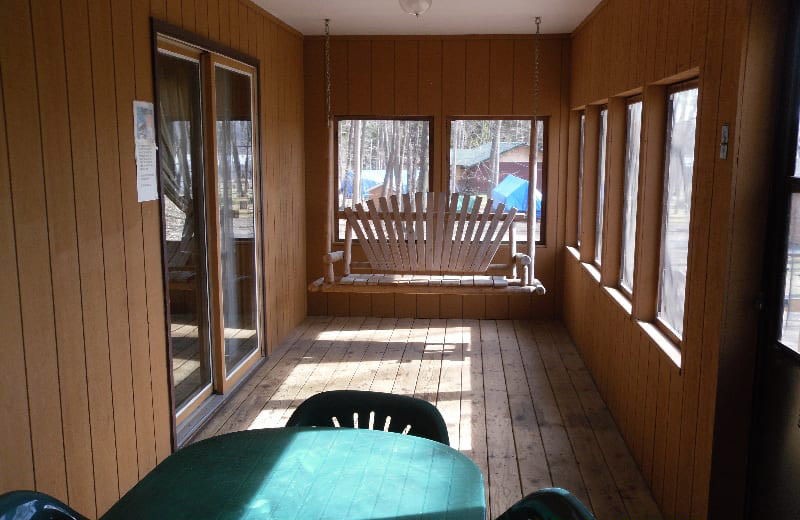 Cabin porch at Red School Resort.