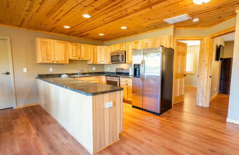 Guest suite kitchen at Appeldoorn's Sunset Bay Resort.