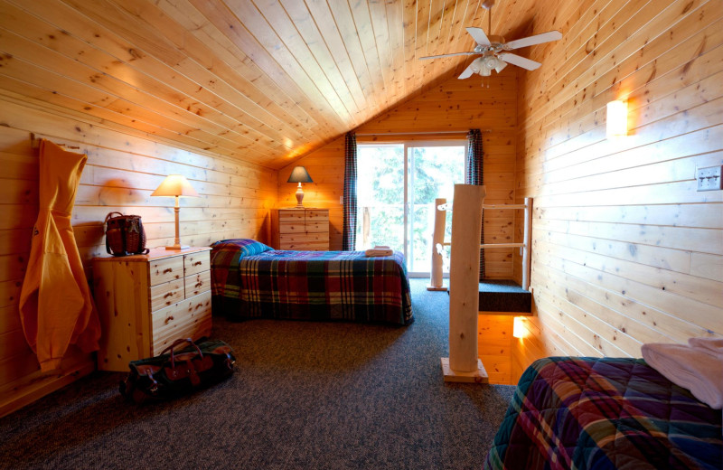 Cabin bedroom at Tetu Island Lodge.