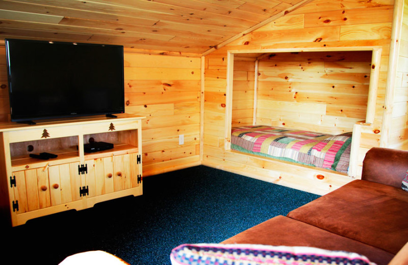 Cabin bedroom at Auger's Pine View Resort.