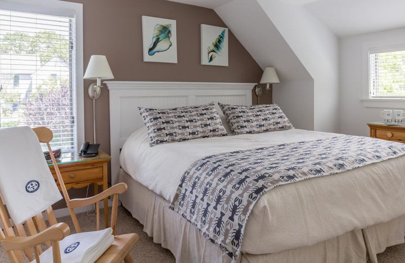 Cottage bedroom at New Seabury Resort.