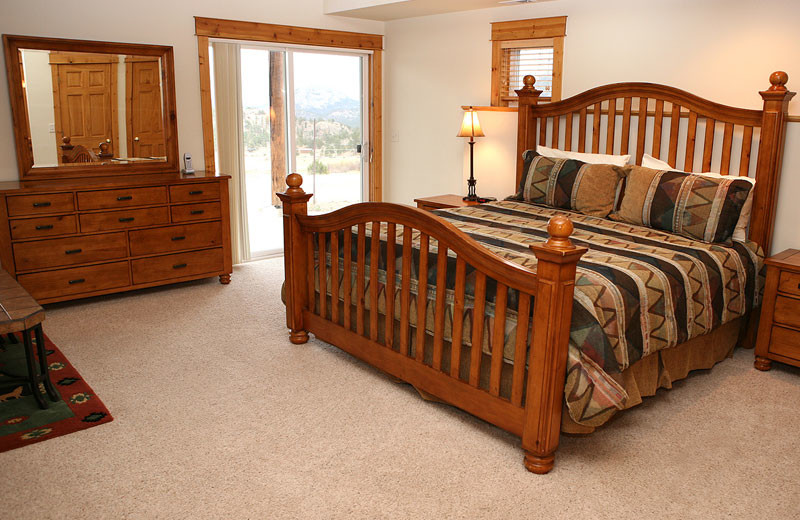 Vacation rental bedroom at Marys Lake Vacation Condos.