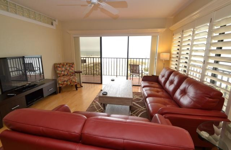 Rental living room at Prime Vacation Rentals.