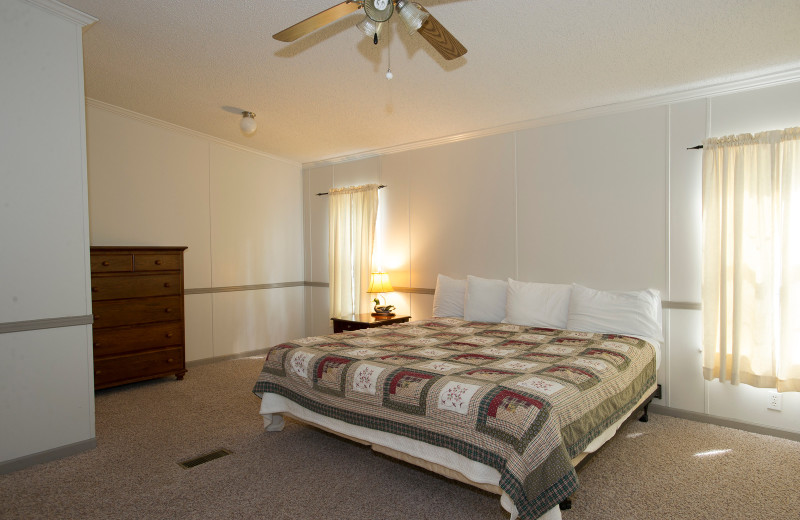 Cabin bedroom at Brady Mountain Resort & Marina.