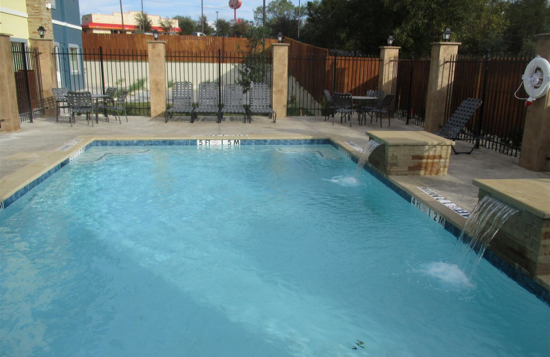 Outdoor pool at BEST WESTERN Plus Lampasas.