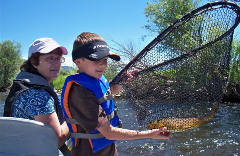 Catching a fish at Montana High Country Lodge.