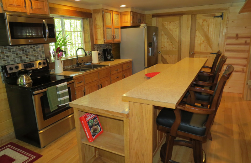 Cabin kitchen at Creeks Crossing Cabins.