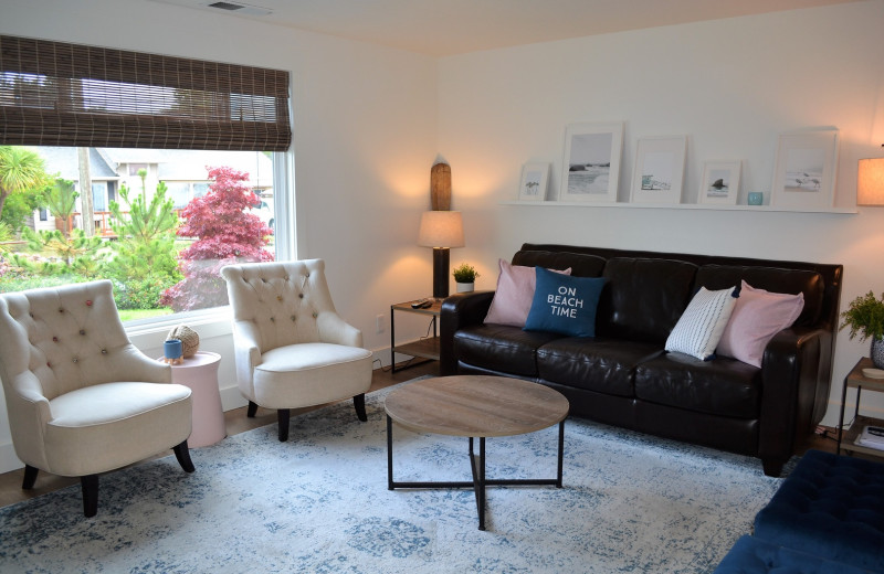 Rental living room at Beachhouse Vacation Rentals.