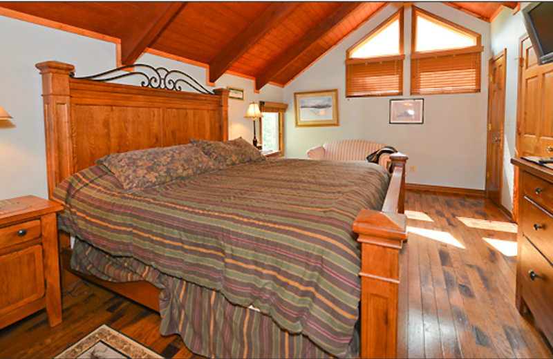 Cabin bedroom at Black Bear Resort Rentals.