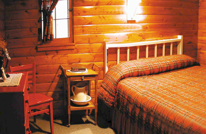 Cabin bedroom at Samara Point Resort.