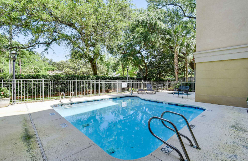 Outdoor pool at Real Escapes Properties - 760 Ocean Blvd 203.