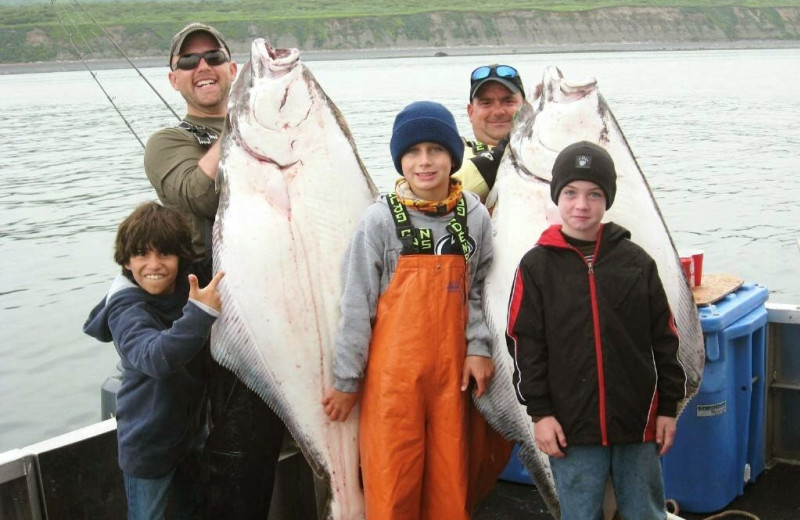 Family fishing at Alaska's Kodiak Island Resort.