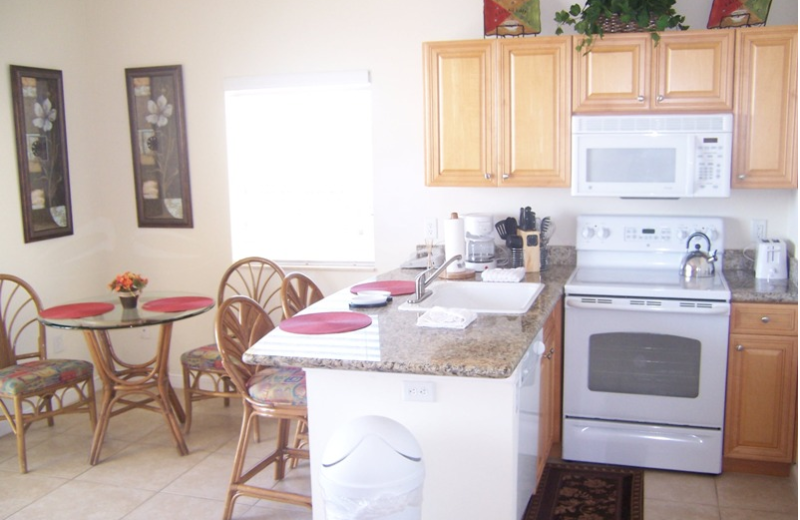 Unit kitchen and dining area at Boca Ciega Resort.