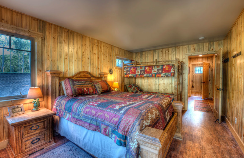 Cabin bedroom at Wild Skies Cabin Rentals.